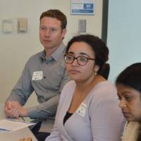 Three alumni volunteers at the 30 Minute Mentors Event